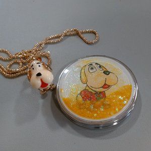 Puppy necklace and compact mirror in goldtone.